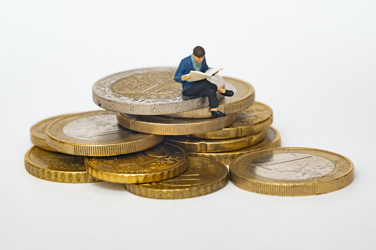 Cryptocurrencies were once a small corner of the market, reserved only for the brave, and which many people didn’t quite understand. Now, cryptos have begun to permeate many different corners of the world and are soaring in the markets, albeit retaining their well-known volatile nature. From huge companies and billionaires like Elon Musk and Tesla, to payment platforms like Visa and PayPal, cryptos are rapidly being accepted into the mainstream culture. In fact, crypto has influenced the world so much that digital currencies are a real consideration for countries like the US, who are looking into creating a digital dollar. There’s no telling how soon the digital dollar could come out, but all signs point to big tech getting involved, with rumours circling about Amazon turning towards cryptocurrency. Let’s take a look at why some think Amazon may be entering the crypto market. Amazon’s possible crypto tango Currently, Amazon does not accept cryptocurrency as payment, but Amazon Web Services (AWS) does have a blockchain technology infrastructure product on offer. However, a job posting was recently discovered online, which showed that Amazon is looking for a “Digital Currency and Blockchain Product Lead.” The job posting states that Amazon is on the hunt for an “experienced product leader to develop Amazon’s digital currency and blockchain strategy and product roadmap.” Naturally, this has created a lot of speculation around Amazon’s future plans in the crypto space. Soon after that, Amazon shares rose by 1% and Bitcoin prices surged over the $40,000 mark. Amazon explained the job posting by saying, “We’re inspired by the innovation happening in the cryptocurrency space and are exploring what this could look like on Amazon. We believe the future will be built on new technologies that enable modern, fast and inexpensive payments, and hope to bring that future to Amazon customers as soon as possible.” In 2013, Amazon first showed their interest in digital currencies when they launched Amazon Coins, which was a virtual currency that customers could use to make purchases in apps and games on Kindle. Amazon Coins are worth about 1 cent each and are still being used today. Then in 2017, Amazon purchased three cryptocurrency web addresses with no further explanation. Unsurprisingly, speculation around Amazon’s next move in the crypto space is rife and City A.M., a UK financial publication, reported that Amazon was working on releasing its own crypto coin in 2022, and would be accepting Bitcoin for payments by the end of 2021. However, Amazon has denied this report, with a representative saying, “Notwithstanding our interest in the space, the speculation that has ensued around our specific plans for cryptocurrencies is not true.” The company has maintained that they are in the exploration phase still, saying “We remain focused on exploring what this could look like for customers shopping on Amazon.” Amazon is a giant tech company that is known to explore many avenues, so even though the company is not yet accepting cryptos, the future remains a question mark. Crypto shift As companies like Tesla move towards the acceptance of cryptocurrencies in the near future, it’s a clear indication of the shift towards crypto amongst big companies. With research being made into a digital dollar and further advancements in the world, it’s unlikely that Amazon is going to be left behind in the crypto and digital currency space, especially considering the company has over 70 openings for blockchain specialists available. However, is Amazon going to accept crypto payments? Will they develop their own coin? Nobody can say for sure yet, but the job posting shows clear signs of Amazon’s interest in crypto, so it’s worth keeping your eyes peeled, as this could be a giant leap for the digital realm.