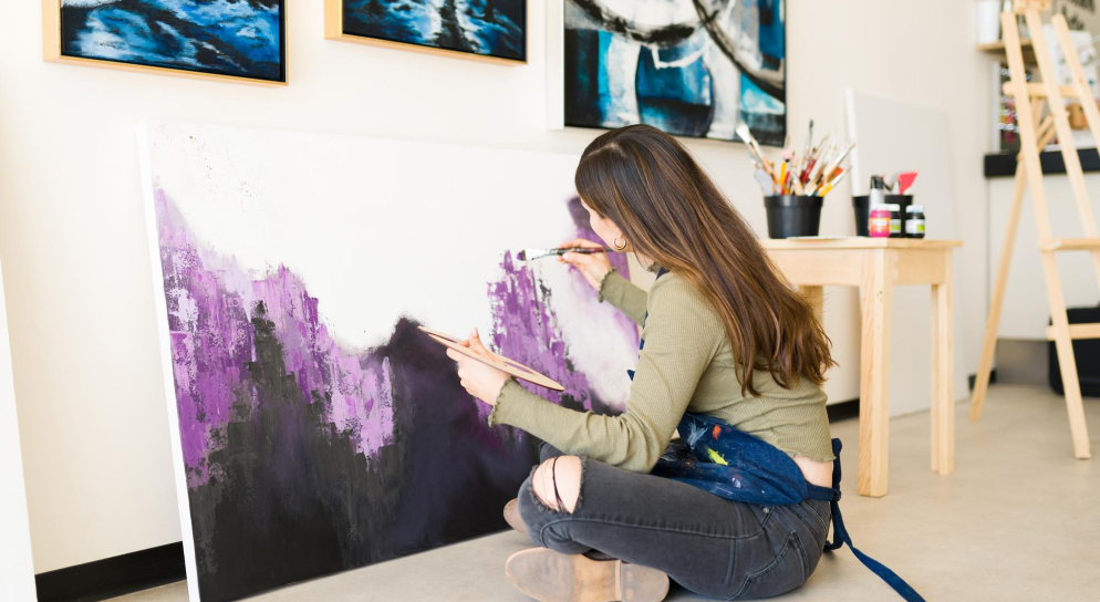 Create a wall with art and paintings